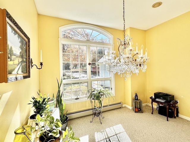 carpeted dining area with baseboards, a baseboard heating unit, and a notable chandelier