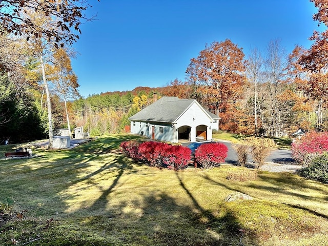 exterior space with a view of trees