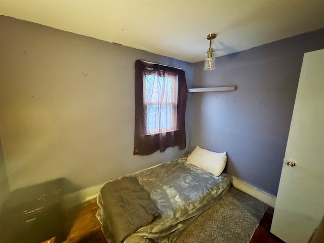 bedroom featuring baseboards