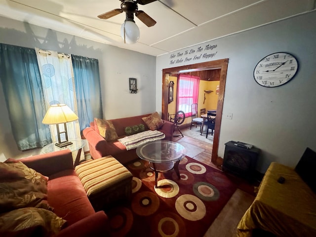 living room featuring a ceiling fan