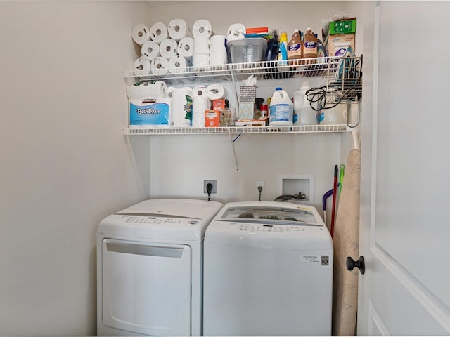 laundry area featuring laundry area and washing machine and clothes dryer