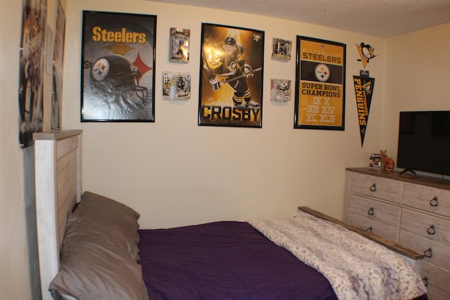 bedroom with a textured ceiling