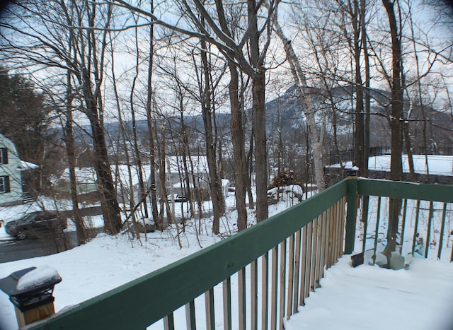 view of snow covered deck