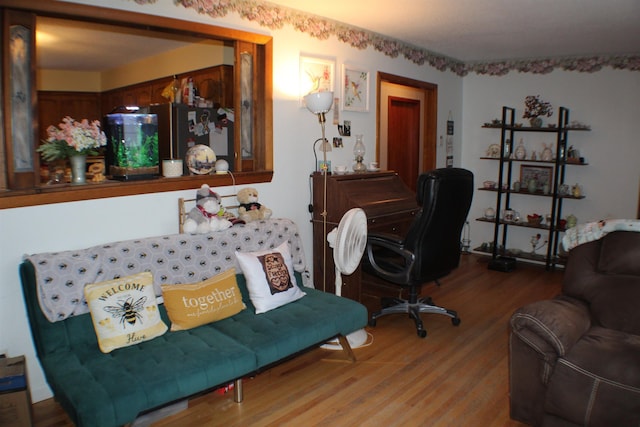 living area with wood finished floors