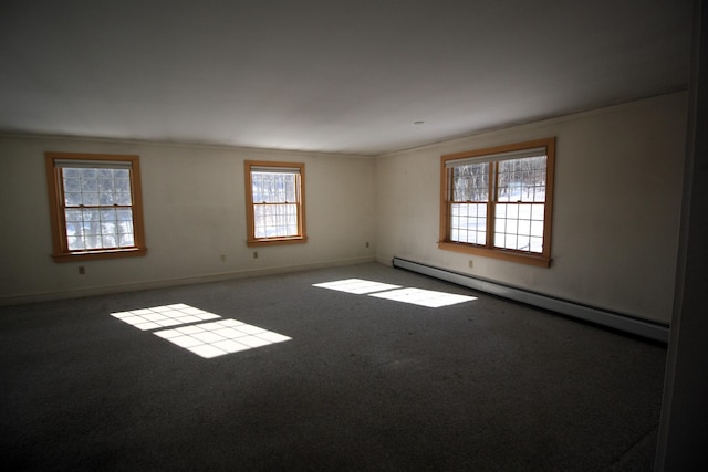 carpeted empty room with ornamental molding, a baseboard radiator, and baseboards