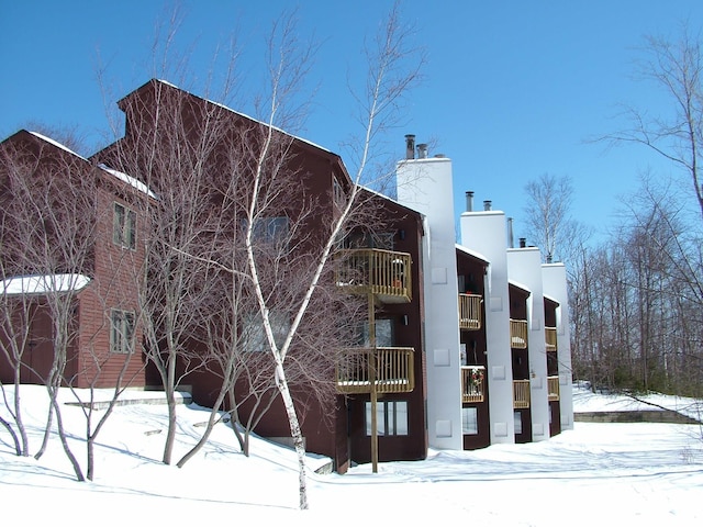 view of snow covered property