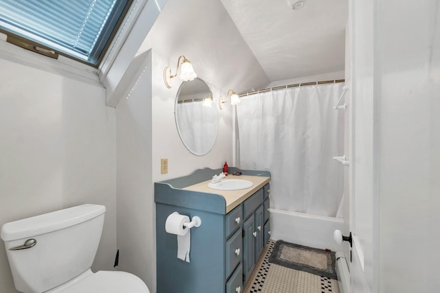 bathroom with shower / bath combo, vanity, and toilet