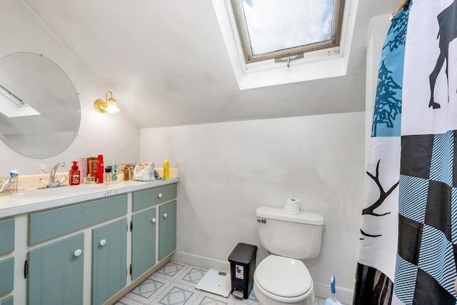 full bath featuring vaulted ceiling with skylight, baseboards, toilet, tile patterned floors, and vanity