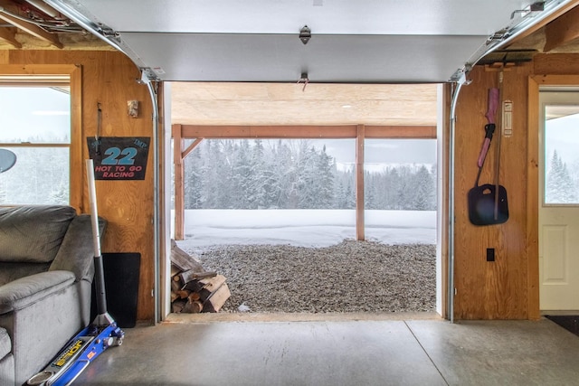 doorway to outside with concrete floors