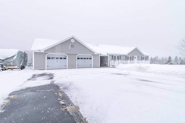 ranch-style house featuring a garage