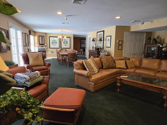 carpeted living room featuring recessed lighting, visible vents, and an inviting chandelier