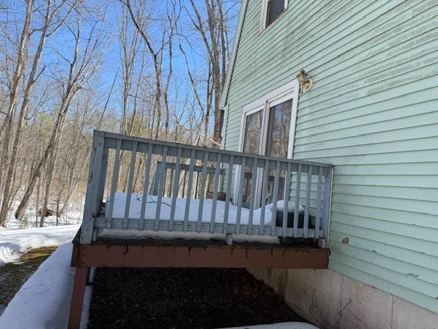 view of snow covered deck