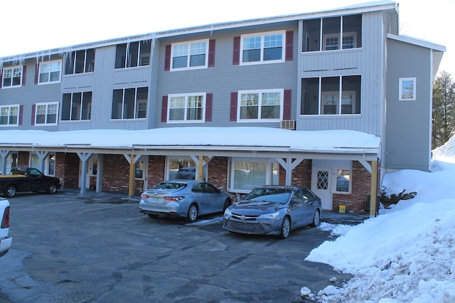 view of front of house with brick siding