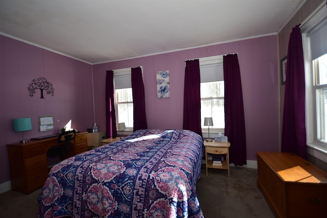 bedroom featuring carpet flooring and crown molding