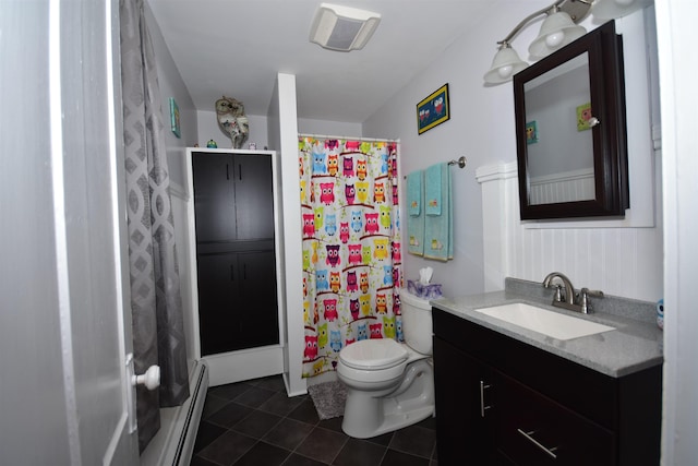 bathroom featuring curtained shower, toilet, baseboard heating, vanity, and tile patterned flooring