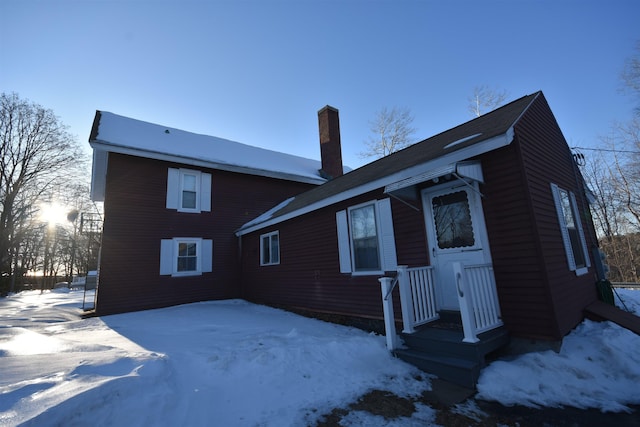 view of front of property with a chimney