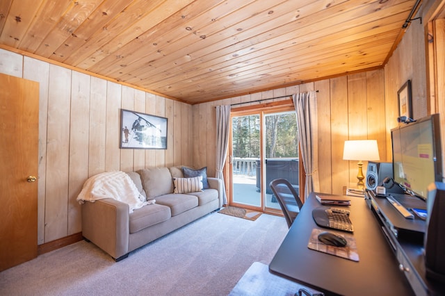 office area with wood ceiling, carpet flooring, and wood walls