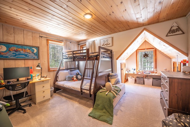 carpeted bedroom with lofted ceiling and wooden ceiling