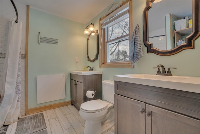 bathroom featuring crown molding, toilet, wood tiled floor, vanity, and a shower with curtain