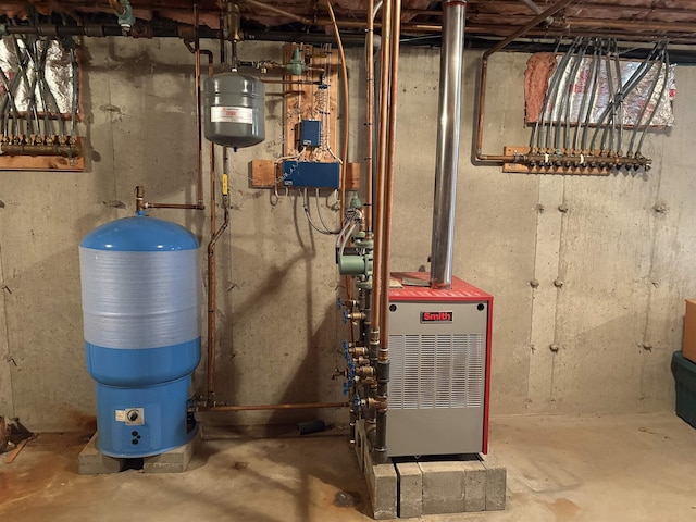 utility room featuring a heating unit