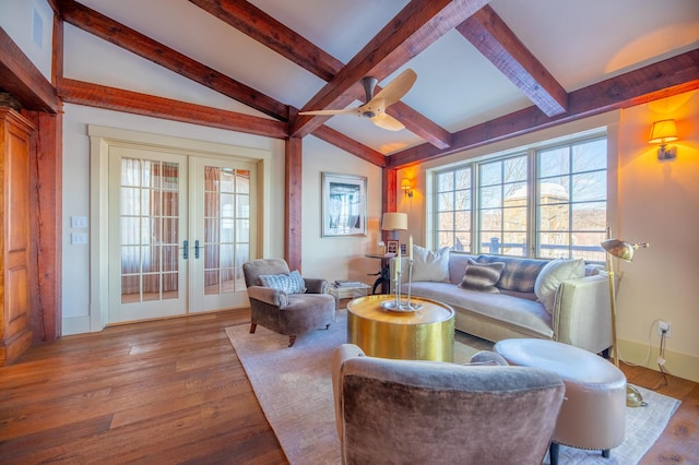 living room with french doors, vaulted ceiling with beams, baseboards, and wood finished floors