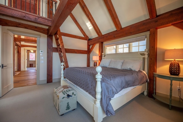 bedroom with carpet floors, beamed ceiling, and high vaulted ceiling