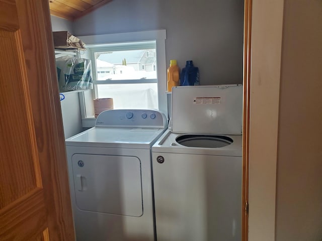 clothes washing area featuring laundry area and washer and dryer