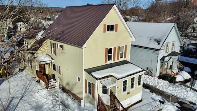 exterior space with metal roof