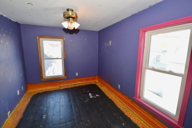 spare room featuring baseboard heating