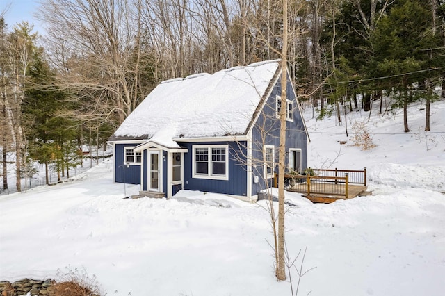 chalet / cabin featuring a wooden deck