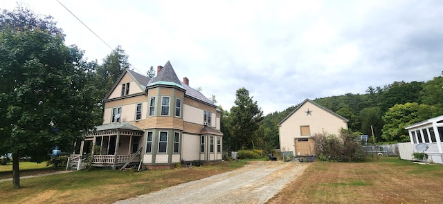 view of front of house with a front yard