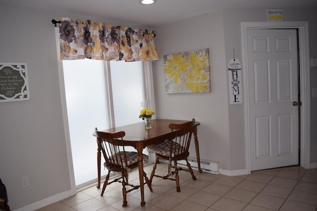 dining room featuring a baseboard heating unit, recessed lighting, baseboards, and light tile patterned floors