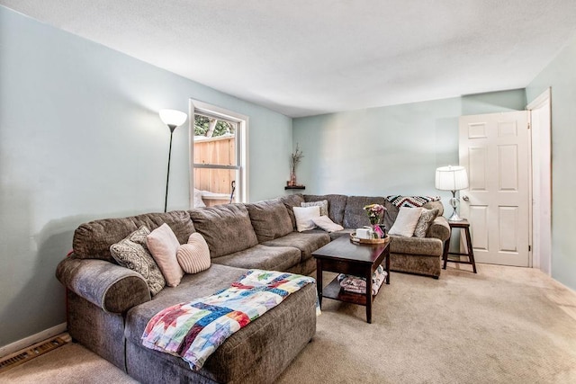 carpeted living room featuring visible vents