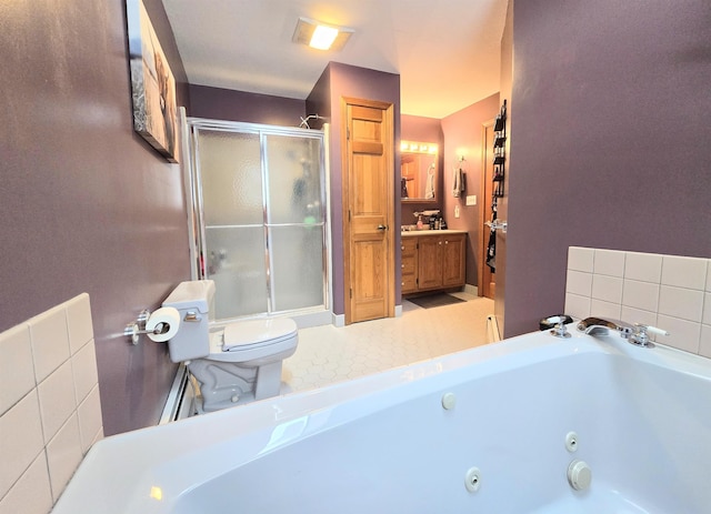 bathroom with a jetted tub, toilet, a shower stall, and vanity