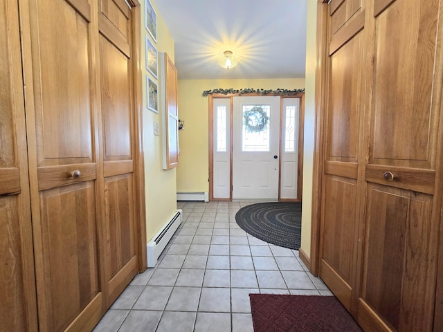 entryway with light tile patterned floors and a baseboard radiator