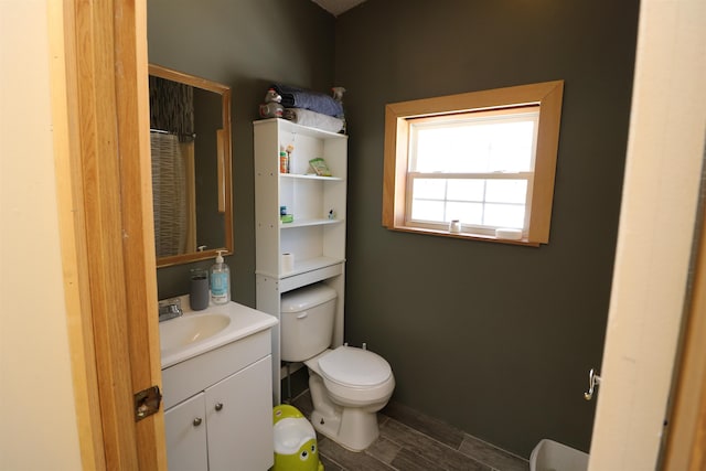 566 Baptist St, Williamstown, VT 05679 - full bath featuring curtained shower, baseboards, vanity, and toilet