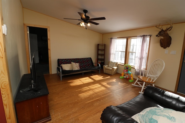 566 Baptist St, Williamstown, VT 05679 - living area featuring lofted ceiling, wood finished floors, and a ceiling fan