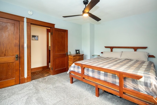 bedroom featuring carpet, baseboards, and ceiling fan