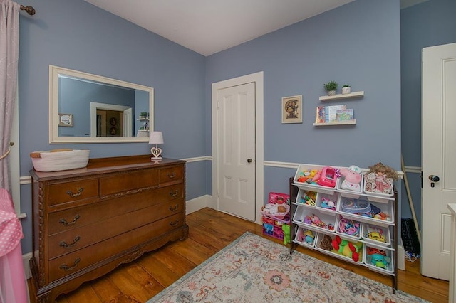 bedroom featuring wood finished floors