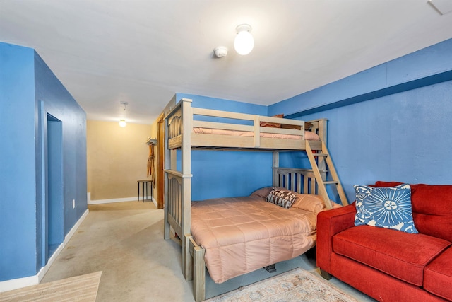 carpeted bedroom with baseboards