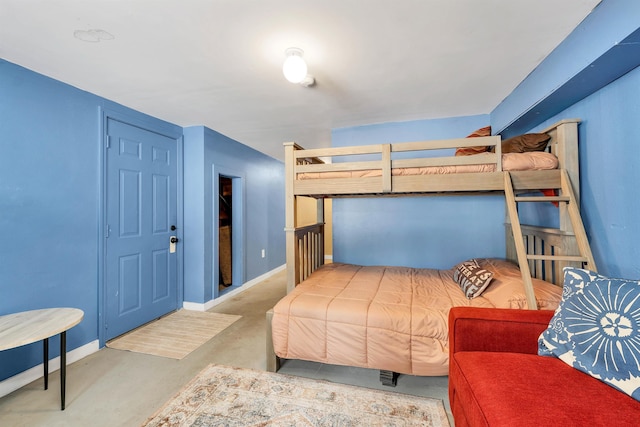 bedroom featuring baseboards