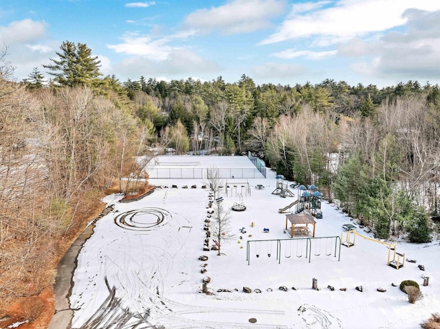 birds eye view of property with a wooded view