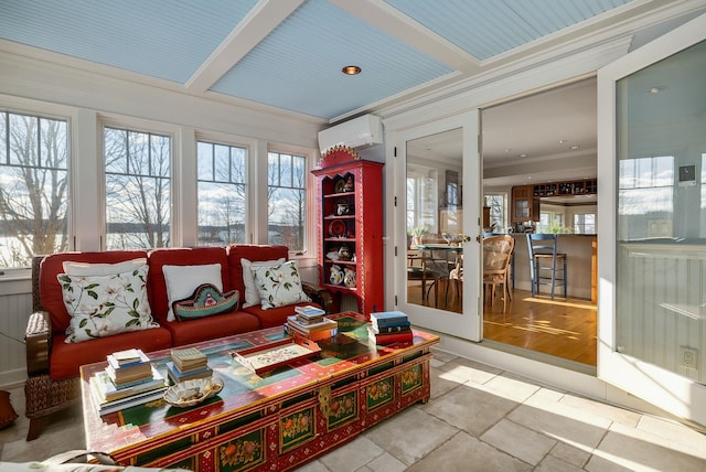 sunroom / solarium with coffered ceiling, beam ceiling, and a wall mounted air conditioner