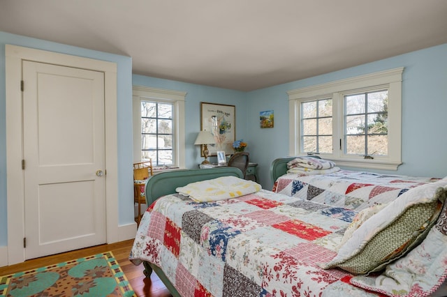 bedroom with light wood-type flooring