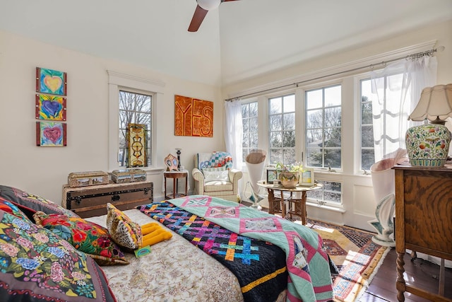 bedroom featuring a ceiling fan and wood finished floors