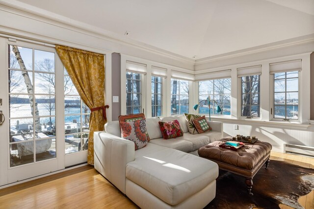 sunroom / solarium with vaulted ceiling