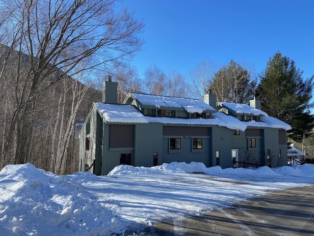 exterior space featuring a chimney