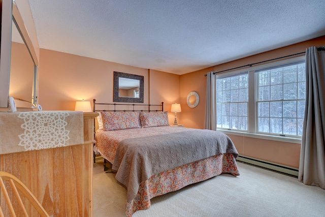 carpeted bedroom featuring a textured ceiling and baseboard heating