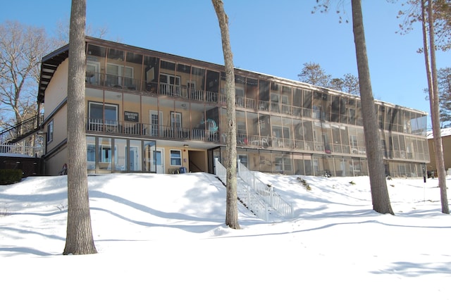 view of snow covered property