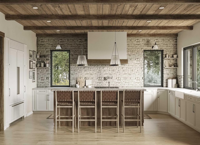 bar featuring wood ceiling, a sink, light wood-style flooring, and beamed ceiling